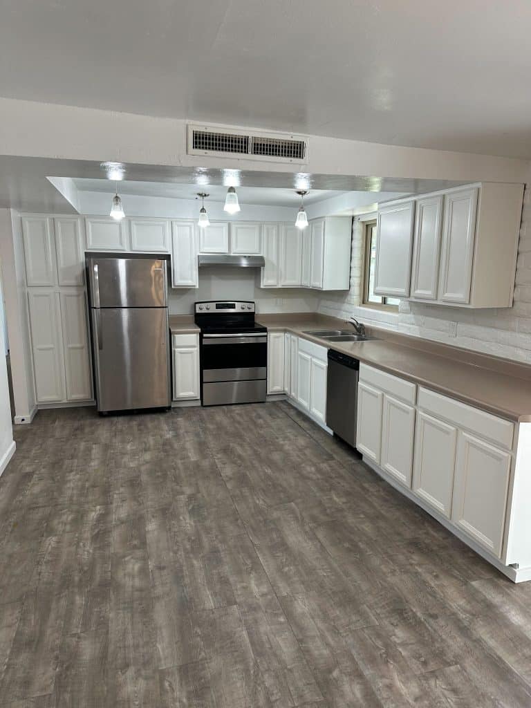 Full kitchen renovation featuring luxury vinyl plank flooring and updated lighting – Kat Remodeling, Tucson AZ