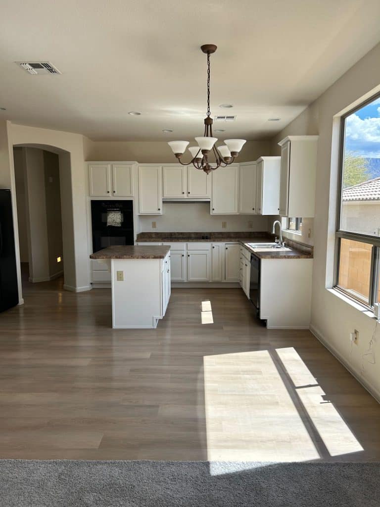 Transitional kitchen and dining space upgrade with clean finishes and classic fixtures – Kat Remodeling, Tucson AZ